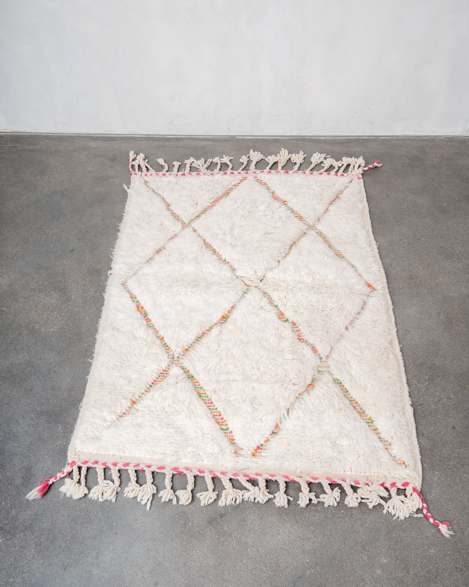 Modern, designer, handcrafted Berber rug from Morocco. Beniourain carpet with beautiful colours and patterns and fluffy wool texture.